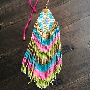 Necklace with Native American inspired design. Finest bead work with silk string